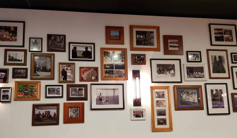 Framed historical pictures on a wall